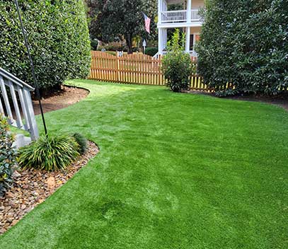 Vibrant synthetic turf enhancing a commercial landscape in North Carolina, reflecting sustainability and beauty.